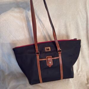 Dooney & Bourke Black Tote with Brown Leather Trim and Red Zipper